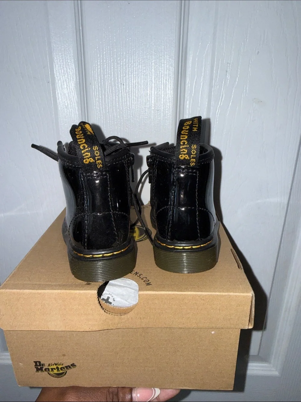 Dr. Martens Kids Black Patent Lace-Up Boots with Yellow Stitching